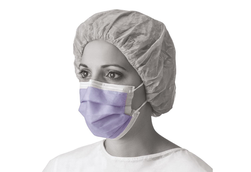 Blue surgical mask against a lavender background.